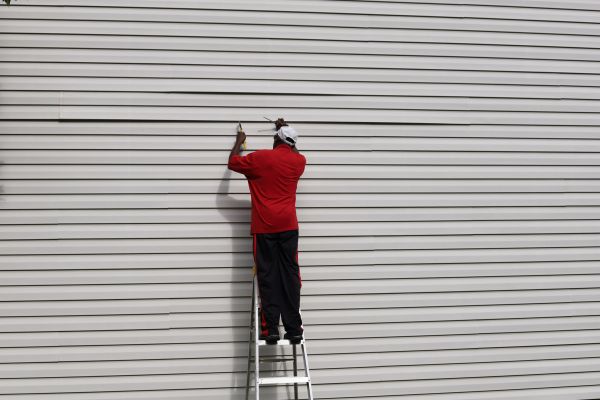 Loose Siding Repair in Manchester
