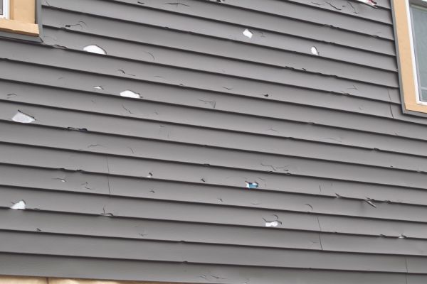 Damaged Siding Replacement in Manchester
